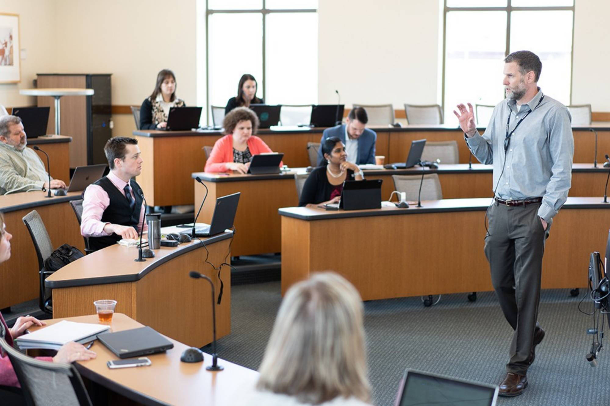 staff giving a lecture to students